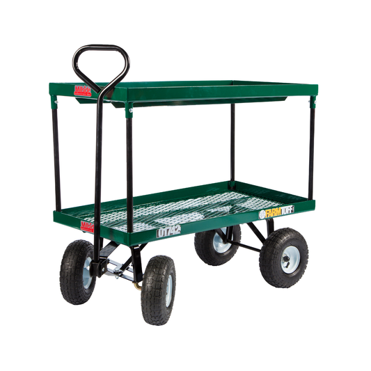 Double tier metal deck wagon with green finish, pneumatic tires, anti-tip steering, ideal for nurseries and greenhouses